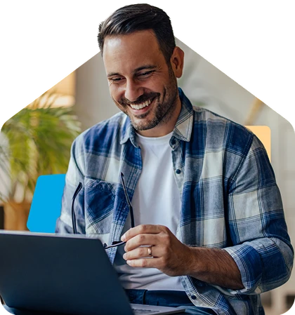 Confident landlord working on laptop